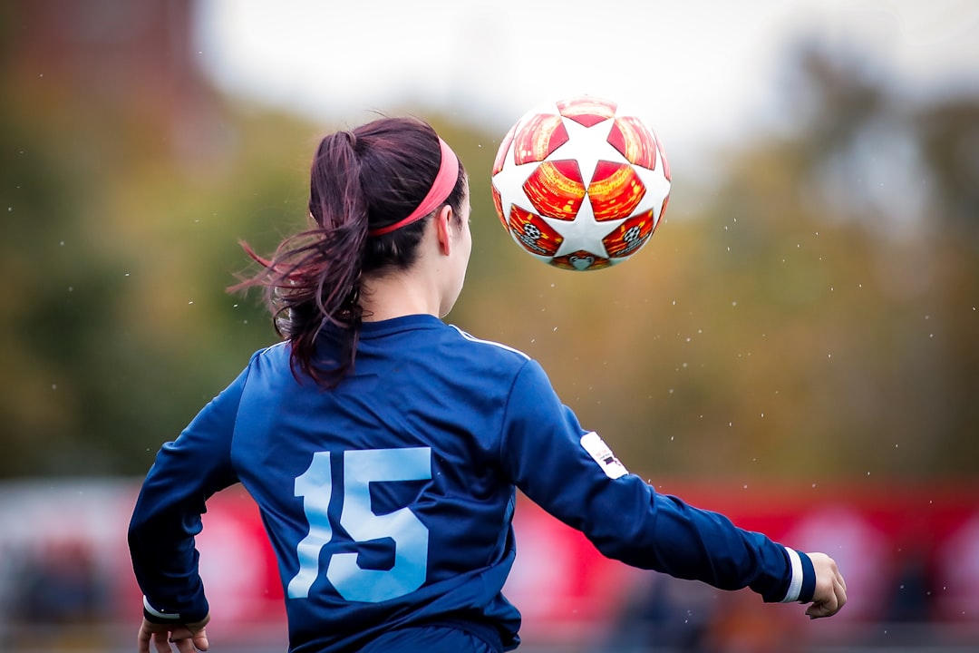 soccer player heading ball